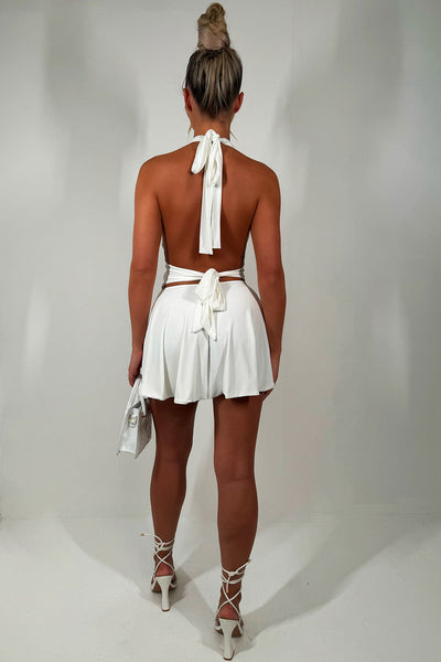 Witte halterjurk met open rug
